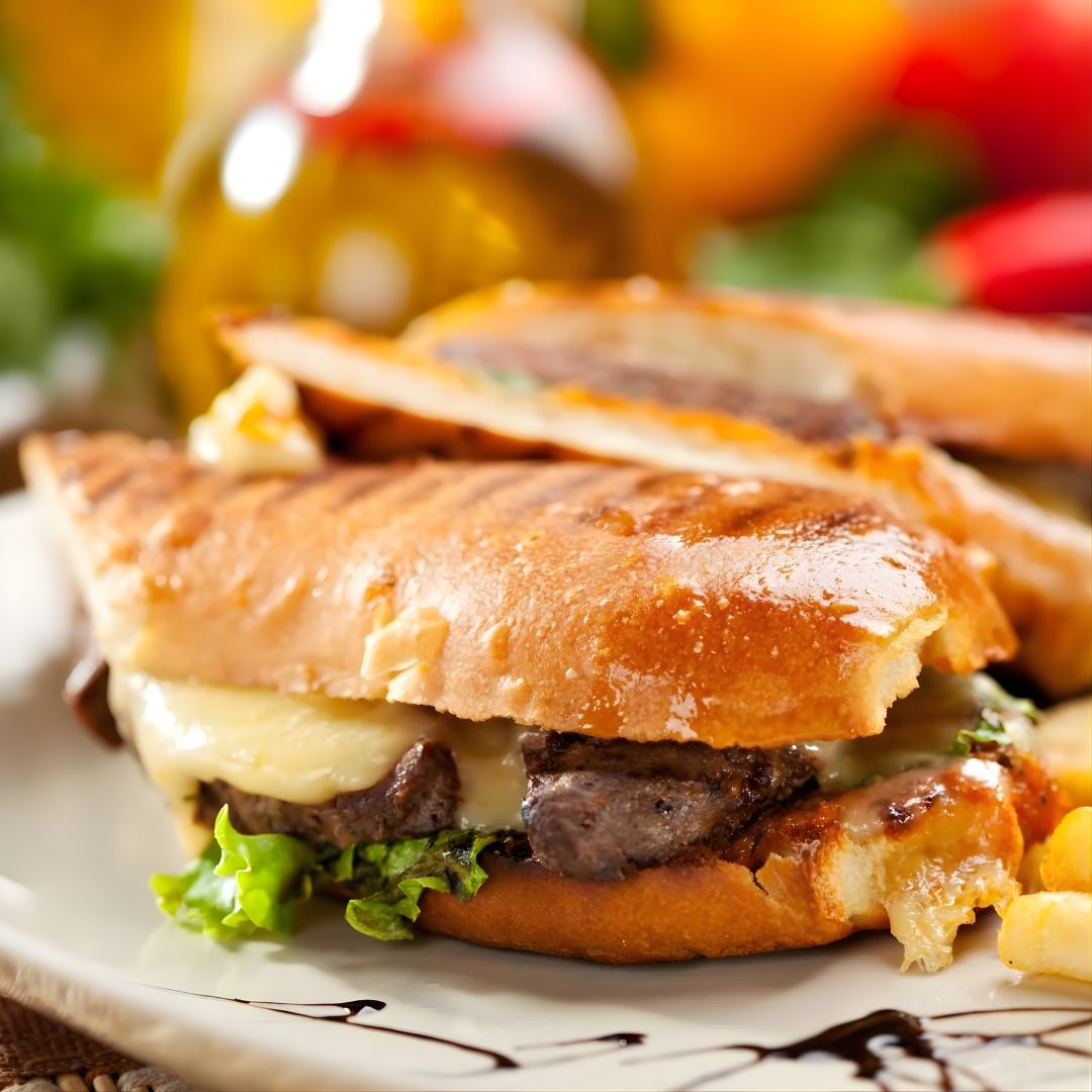 Steak & Fontina Panini with Spicy Chimichurri Sauce at The Little Shop of Olive Oils