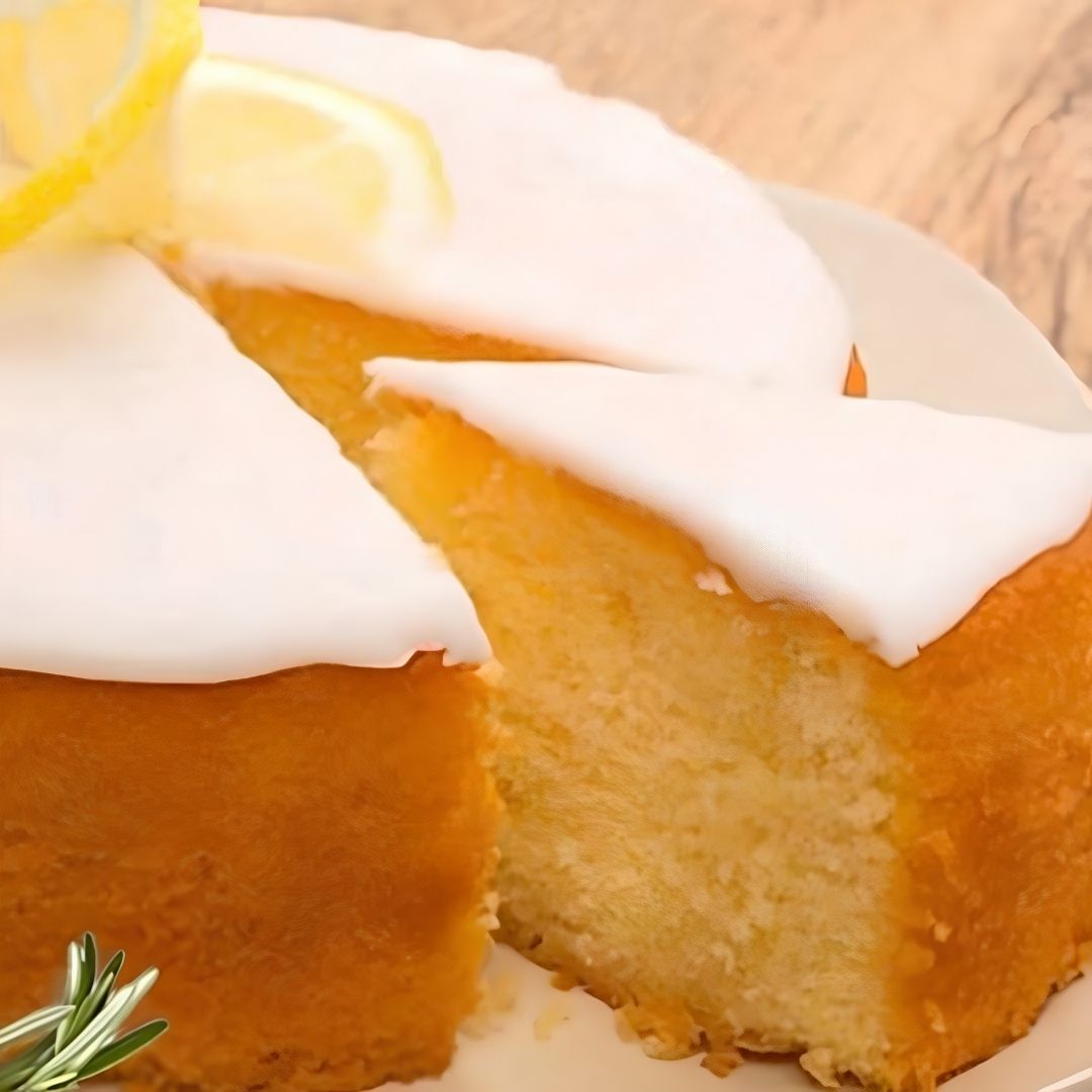 Lemon and Rosemary Cake with Cream Cheese Frosting made with Rosemary Premium Extra Virgin Olive Oil and Sicilian Lemon White Balsamic Vinegar from The Little Shop of Olive Oils