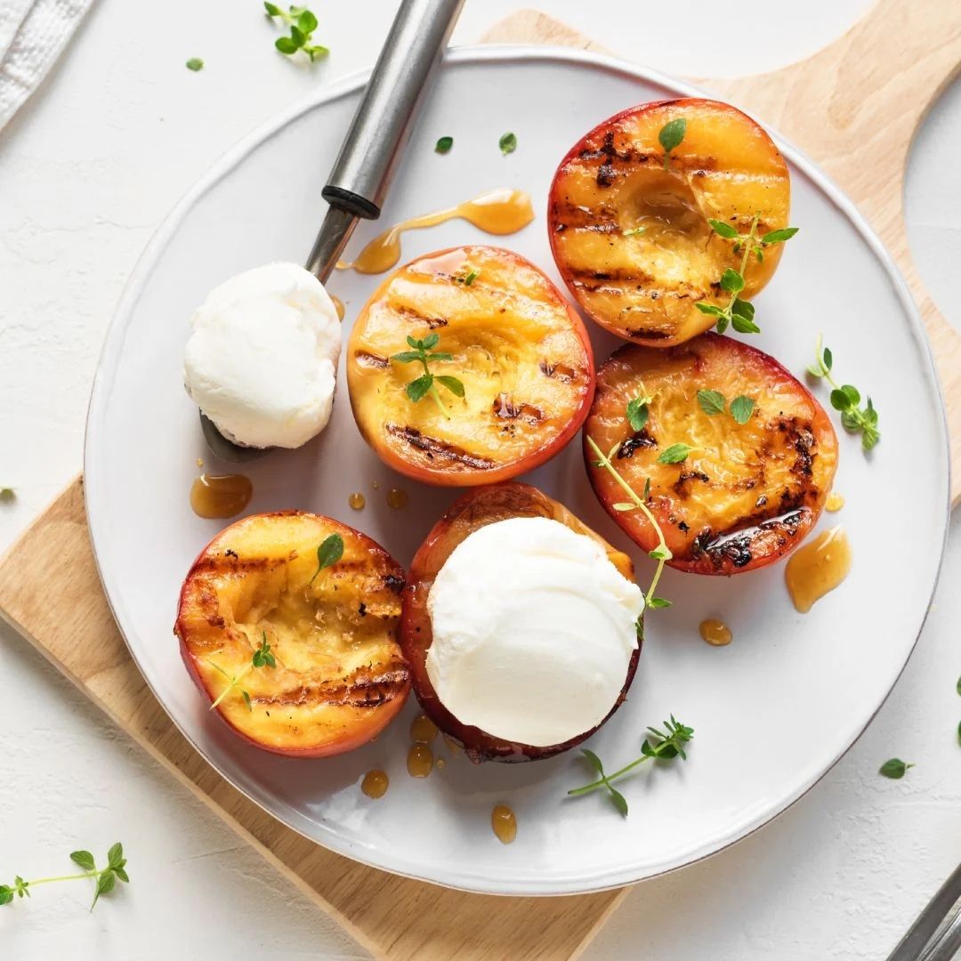 Grilled Peach with Ice Cream made with Peach Balsamic Vinegar and Franklin Raw Honey from The Little Shop of Olive Oils