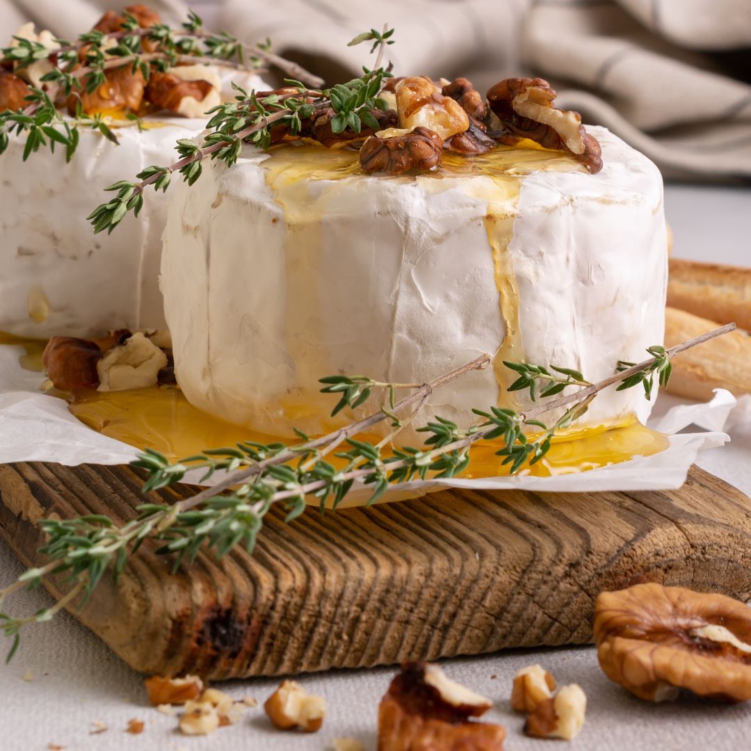 Baked Brie with Walnut, Fig Balsamic, and Honey Drizzle Recipe at The Little Shop of Olive Oils Gourmet in Franklin MA
