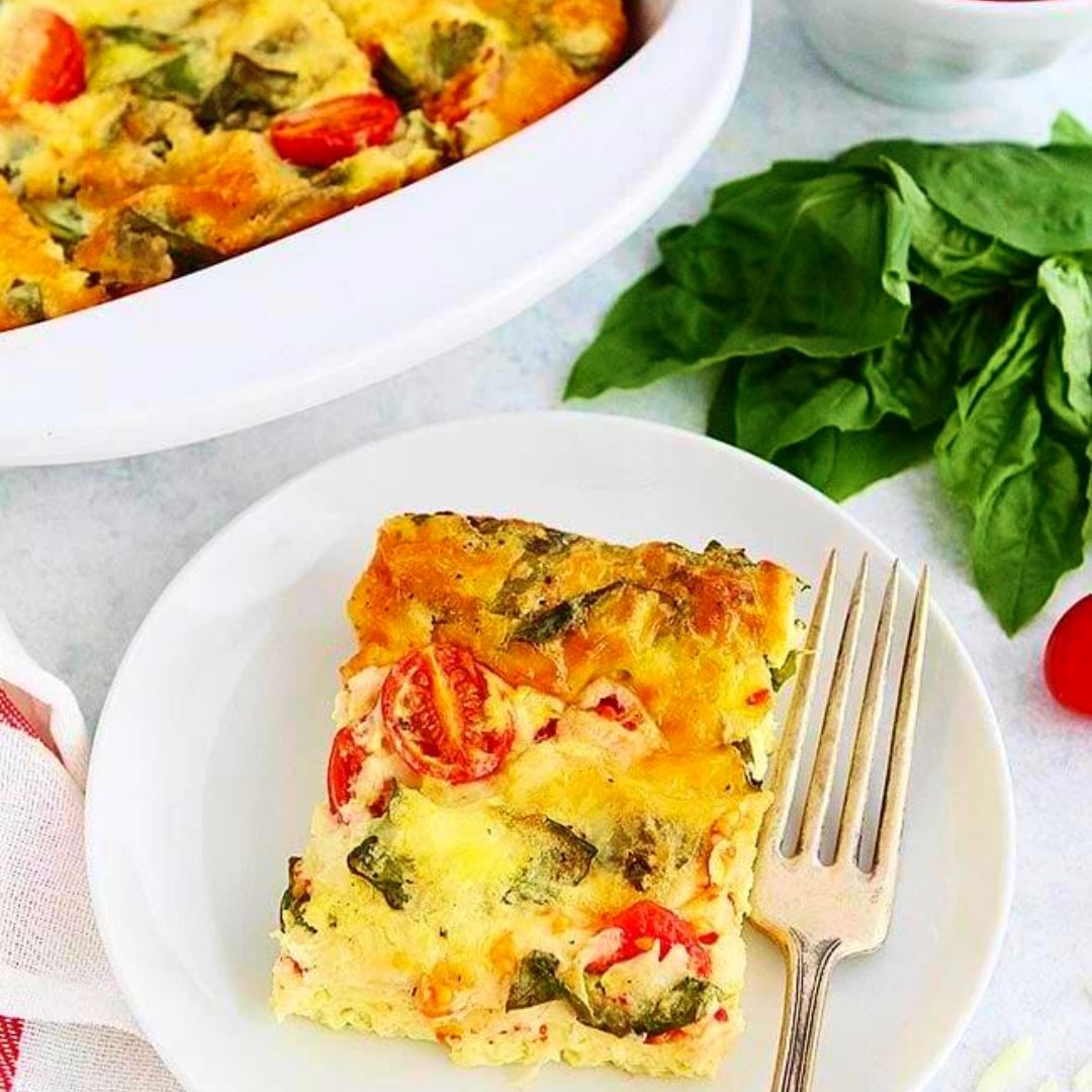 This Caprese Breakfast Casserole recipe is the perfect dish for a brunch crowd! You can throw it together in a snap or make it ahead of time. 