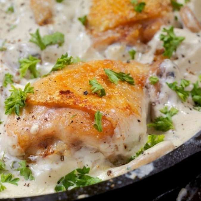 Creamy Garlic Chicken Thighs: Crispy, Creamy & Loaded with Garlic Goodness Recipe at The Little Shop of Olive Oils