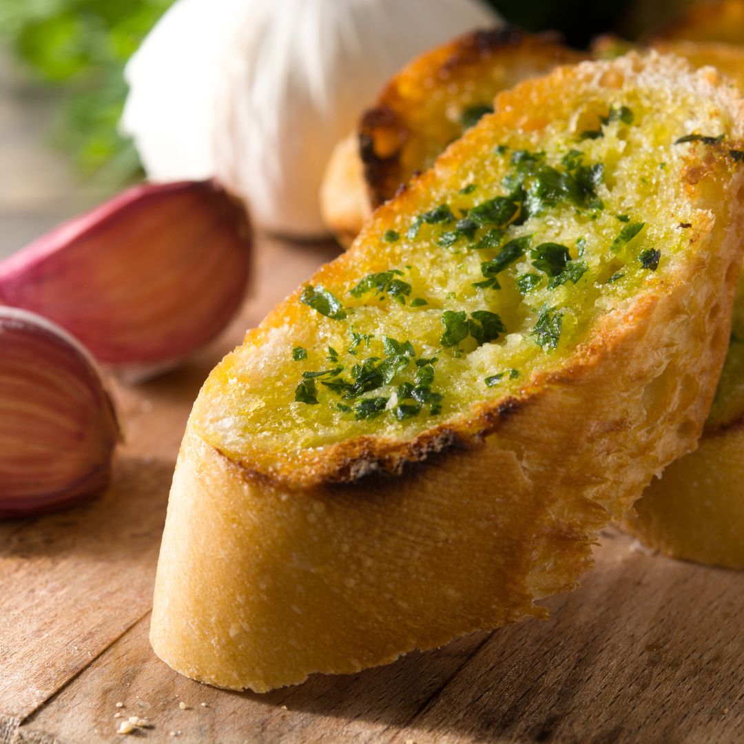 Garlic Bread...crusty, spiced, aromatic, hot, and crisp!  It's worth turning on your oven! Extra Virgin Olive Oil and Aged Balsamic Vinegar!