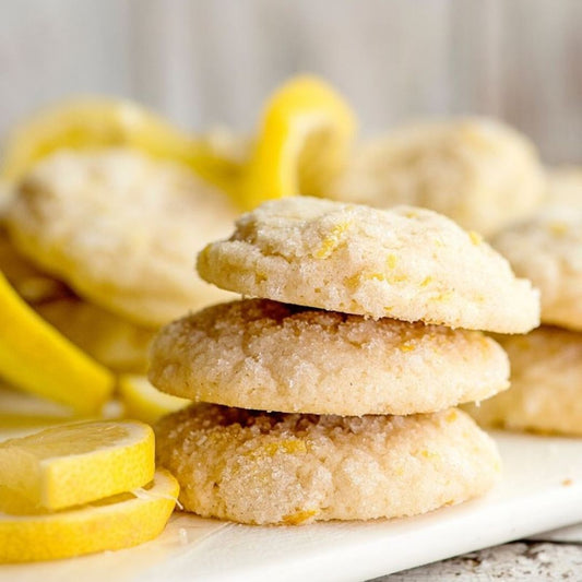 These Lemon Olive Oil Sugar cookies are chewy, soft, and easy to make! They’re bursting with lemon flavor, perfect for all occasions, and dairy-free!