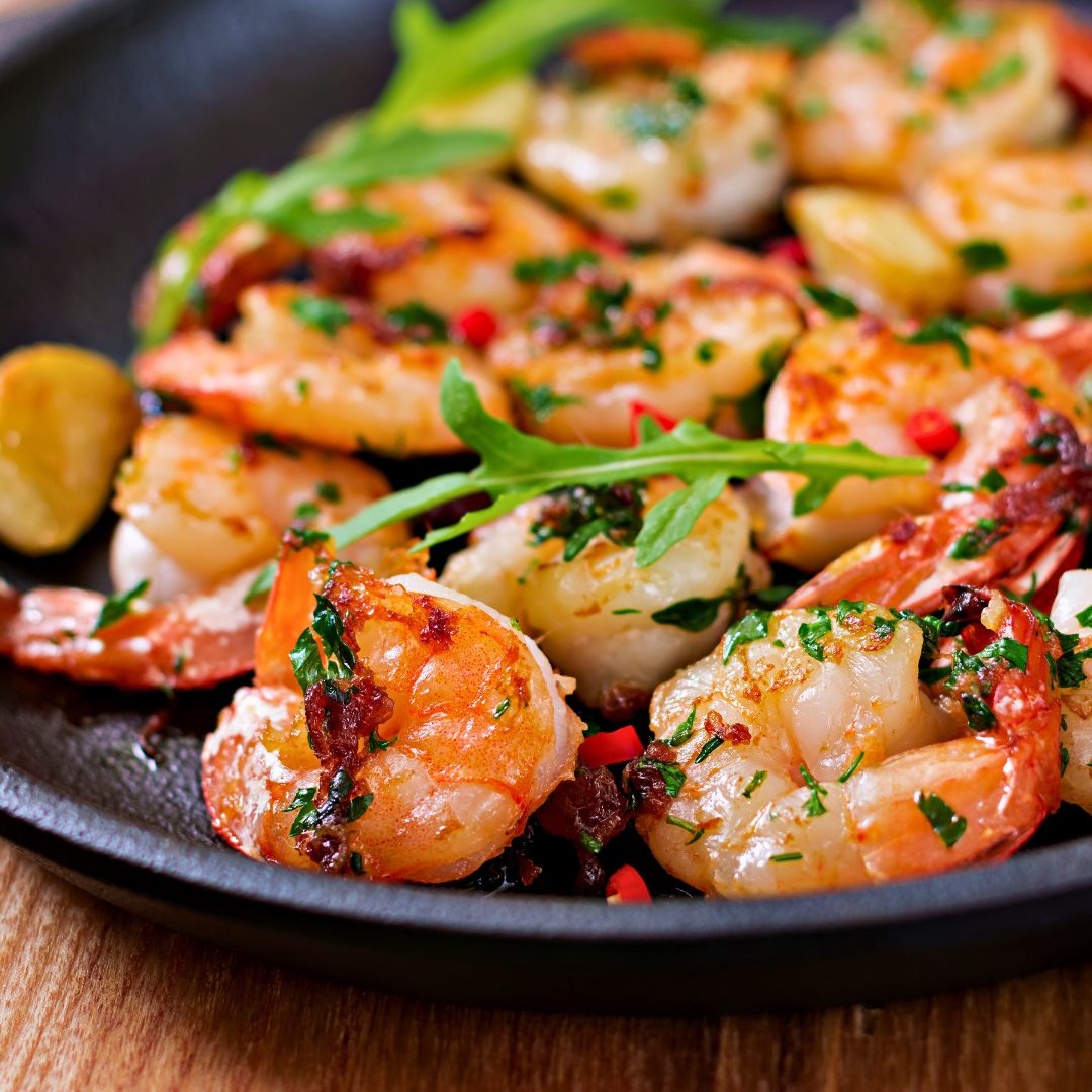 https://www.shopevoo.com/cdn/shop/articles/Skillet_Garlic_Butter_Shrimp_at_The_Little_Shop_of_Olive_Oils.jpg?v=1737846370