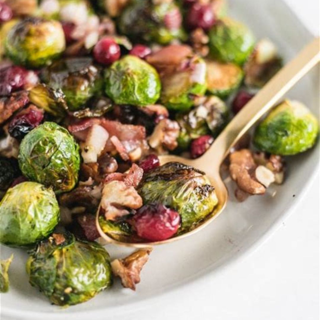 With sweet cranberries, toasty walnuts, and a maple-balsamic glaze, these roasted brussels sprouts are sure to be a hit as your holiday side dish!