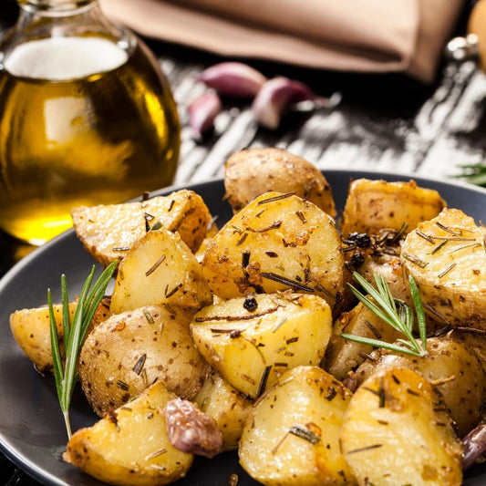 The BEST roasted red potatoes! Full of flavor from the garlic and herbs and tossed with Parmesan goodness and roasted to crisp-tender perfection!