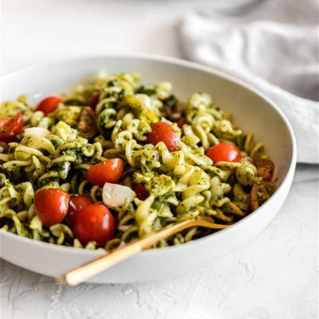 This Zesty Pesto Pasta Salad will the focal point of your table thanks to its vibrant green color! We took traditional basil pesto to the next level with spinach and almonds. A tablespoon of balsamic vinegar gives the whole dish a little extra tang!