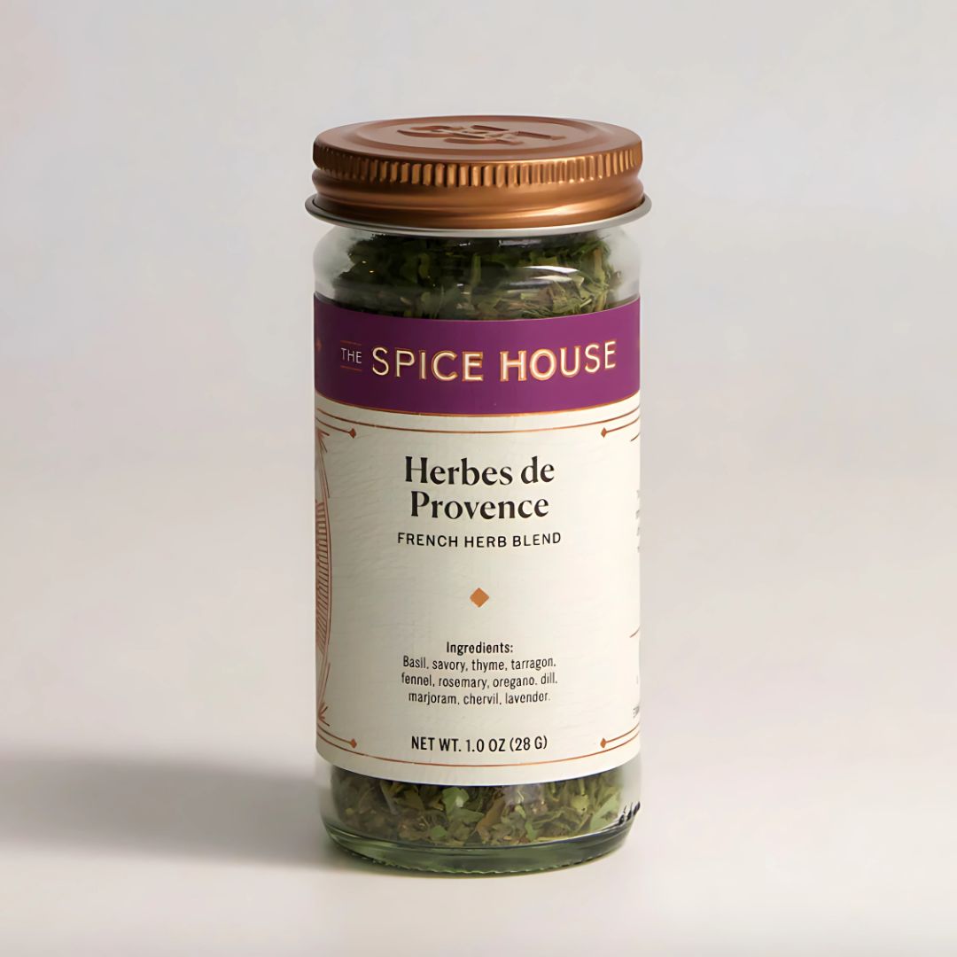 Jar of Herbes de Provence from The Spice House on a light gray background