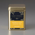 Gold tea canister with 'Mark T. Wendell Tea Company' label on a gray background